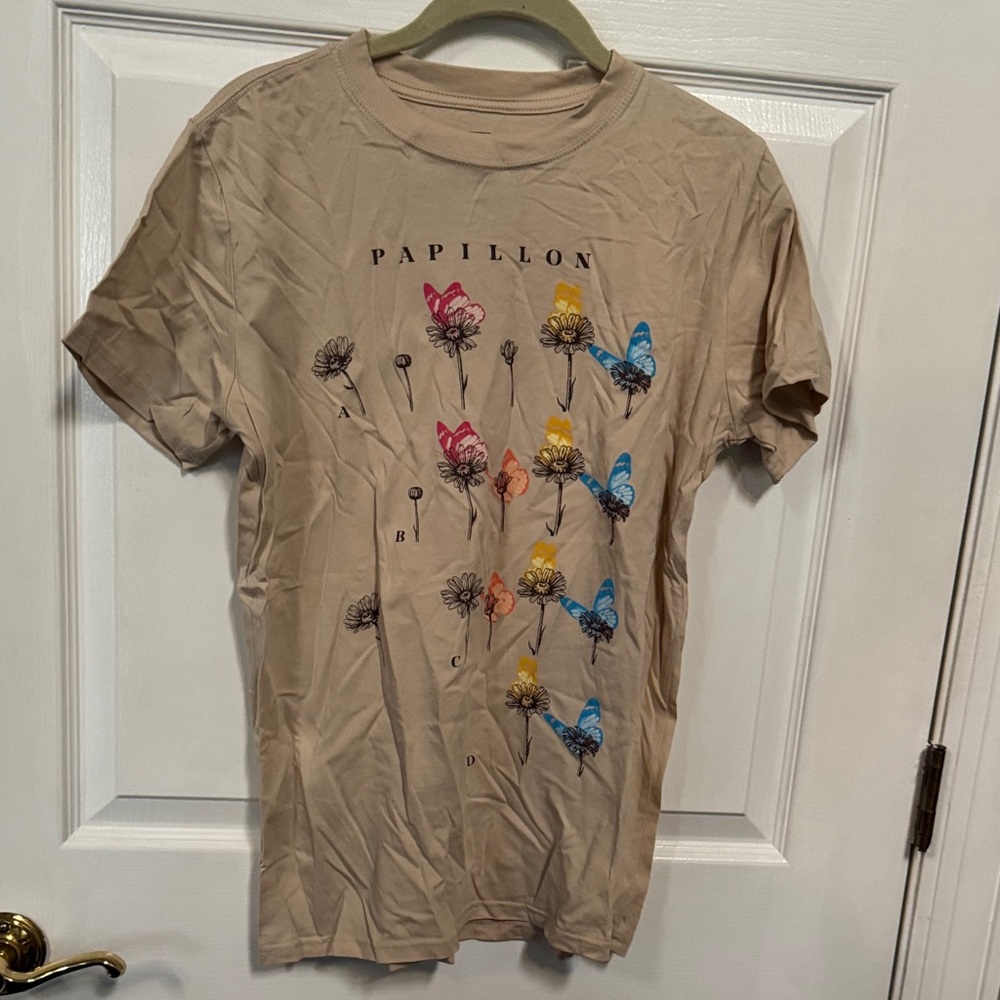 Mighty Fine Beige Graphic Tee with Black Logo. Floral designs